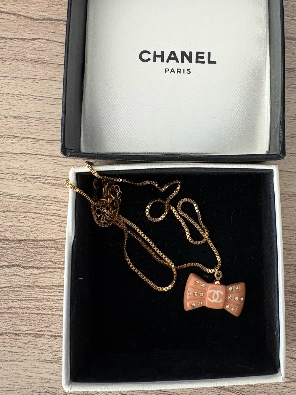 CHANEL Gold Chain Necklace with Pink Bow Charm and Crystal Accents